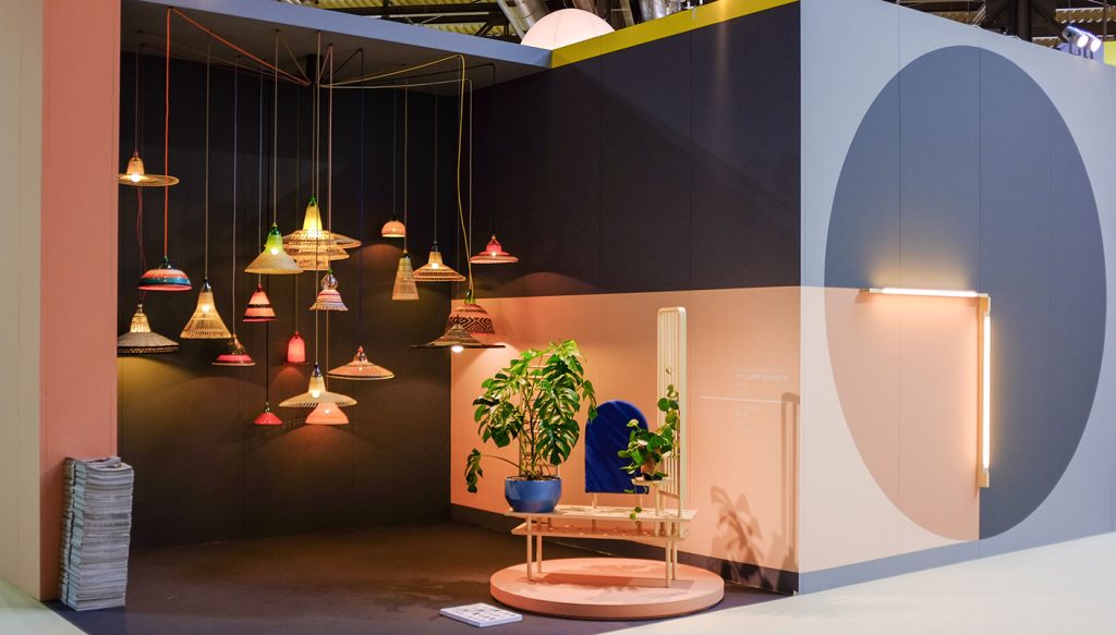 A colorful stand at SaloneSatellite